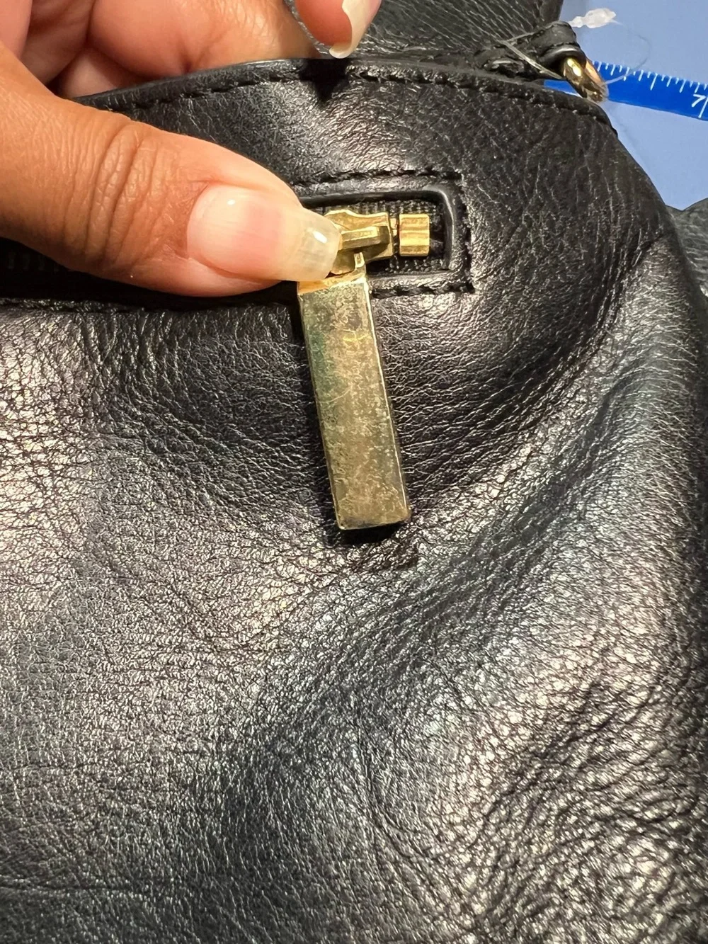 Pre-loved Tory Burch Black Leather clutch with Gold hardware
